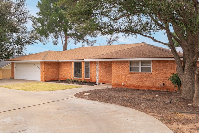 single story home featuring a garage