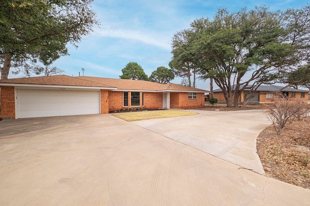 single story home featuring a garage