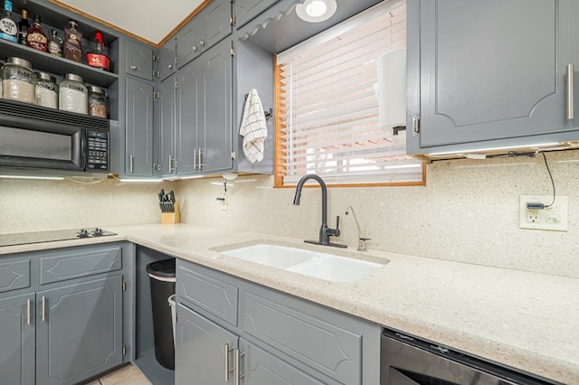 kitchen featuring gray cabinets, sink, tasteful backsplash, and black appliances