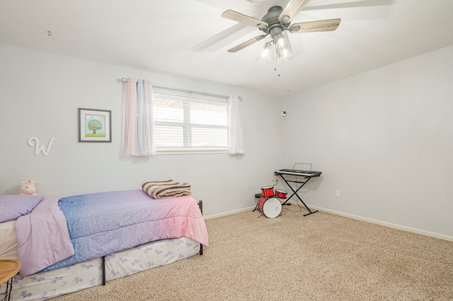 bedroom with light carpet and ceiling fan