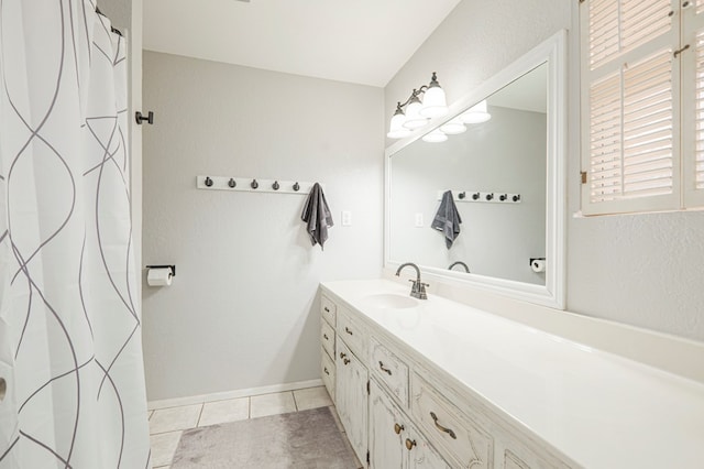 bathroom featuring vanity and tile patterned floors