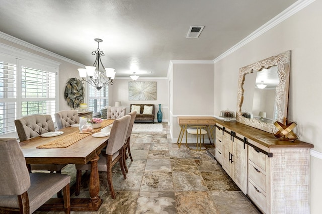 2406 Stutz Pl, Midland, TX 79705 - dining area featuring a chandelier, stone finish flooring, and ornamental molding