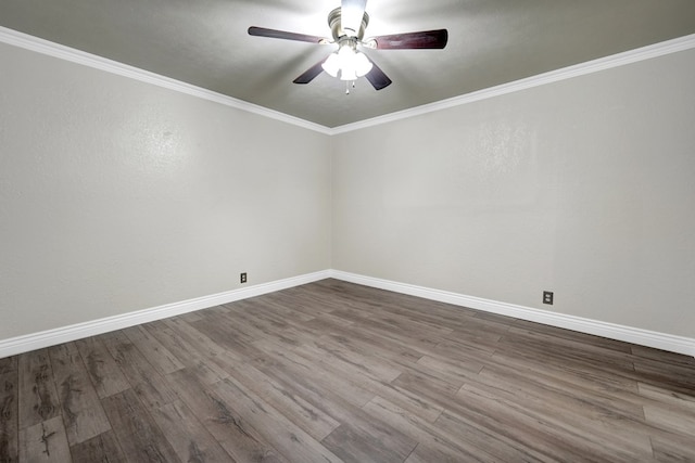 2406 Stutz Pl, Midland, TX 79705 - unfurnished room featuring ceiling fan, dark wood-style floors, and crown molding