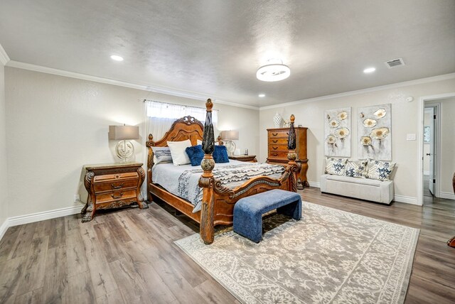2406 Stutz Pl, Midland, TX 79705 - bedroom featuring wood finished floors, ornamental molding, and recessed lighting