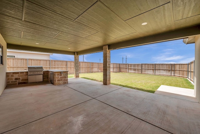 view of patio / terrace with area for grilling and a grill