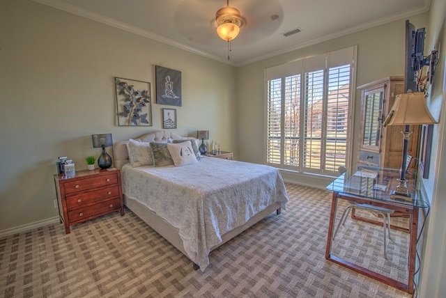 bedroom featuring crown molding and light colored carpet