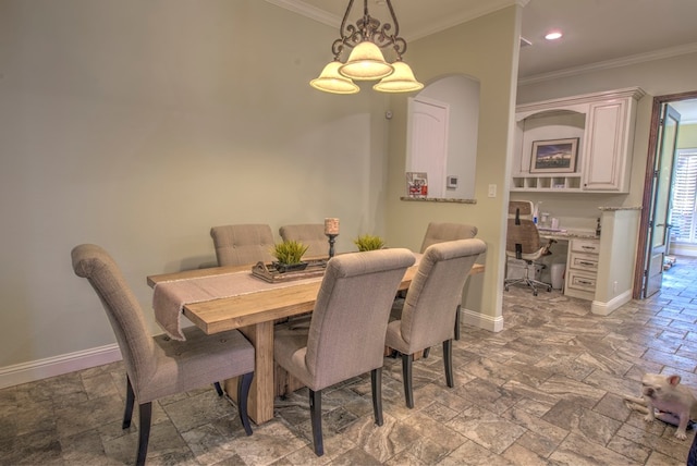 dining area with ornamental molding