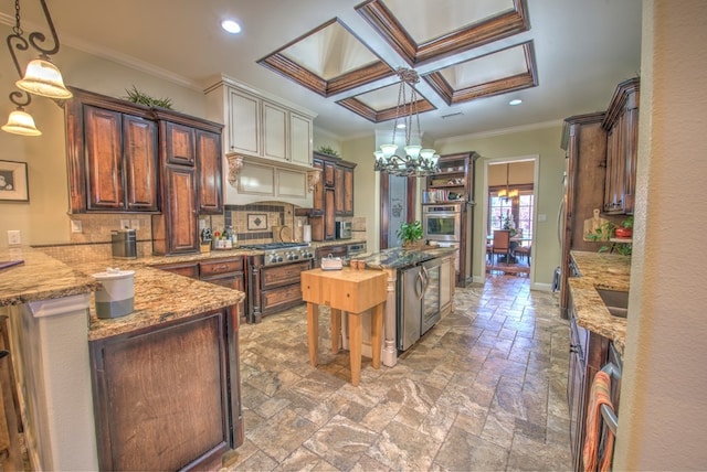 kitchen with tasteful backsplash, a center island, ornamental molding, appliances with stainless steel finishes, and pendant lighting