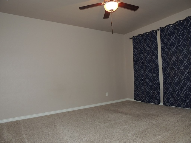 carpeted empty room with ceiling fan