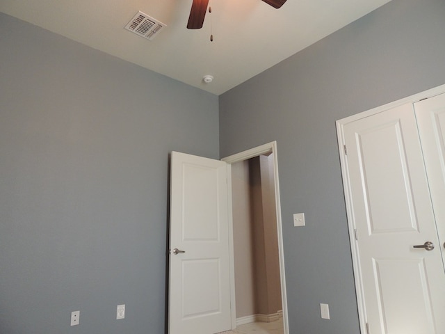 unfurnished bedroom with ceiling fan