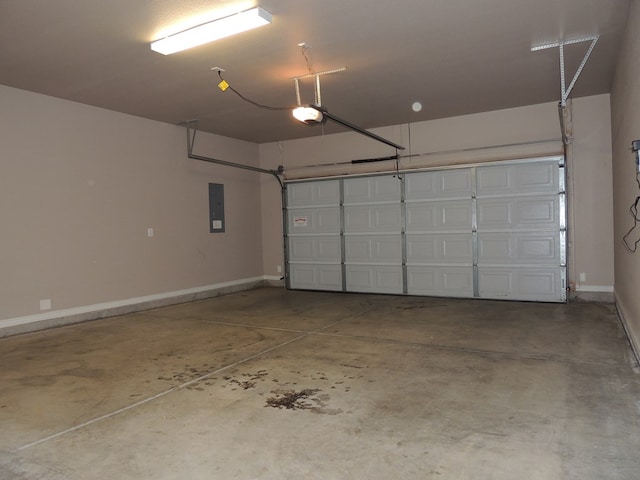 garage with electric panel and a garage door opener