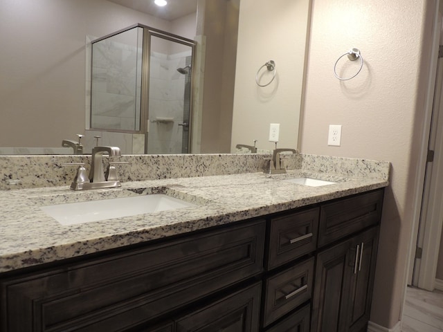 bathroom featuring vanity and walk in shower