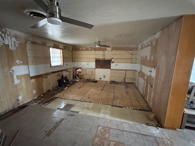 kitchen featuring ceiling fan