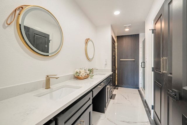 bathroom featuring vanity and walk in shower