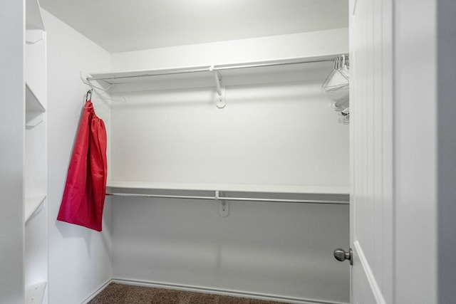 802 Wagner, Midland, TX 79707 - walk in closet featuring carpet