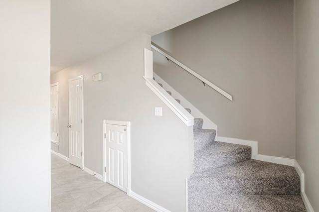 stairway with baseboards