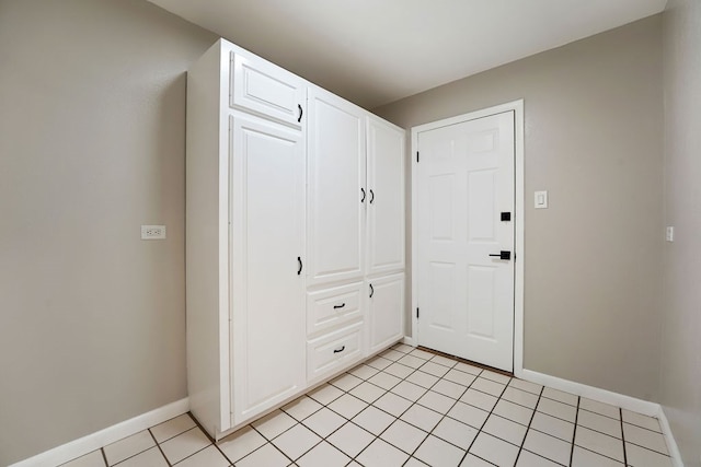 interior space featuring light tile patterned flooring