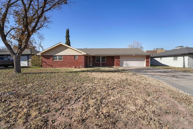 single story home featuring a garage