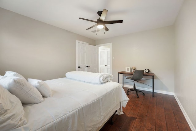 bedroom with ceiling fan and dark hardwood / wood-style floors