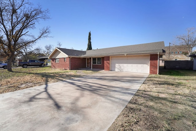 ranch-style house featuring a garage