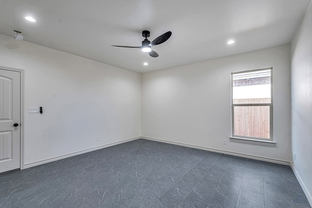 unfurnished room with ceiling fan