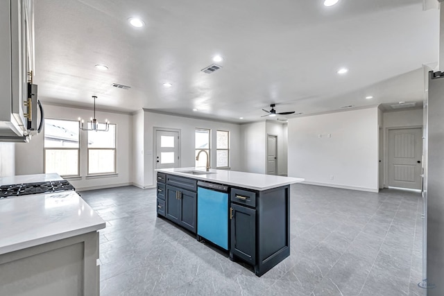 kitchen with blue cabinets, sink, a center island with sink, dishwasher, and ceiling fan with notable chandelier