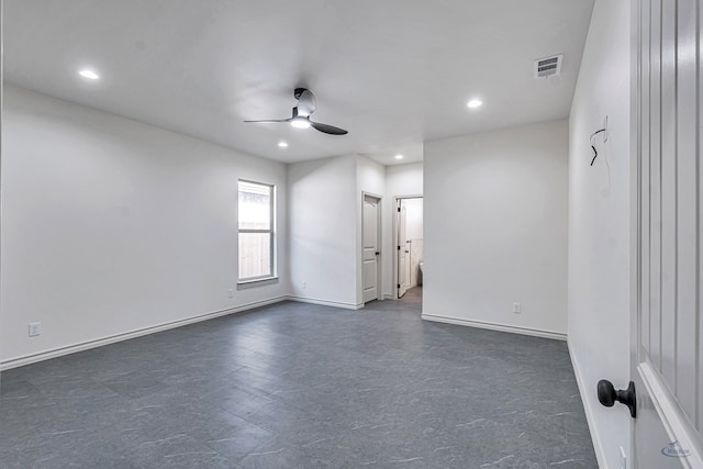 unfurnished room with ceiling fan