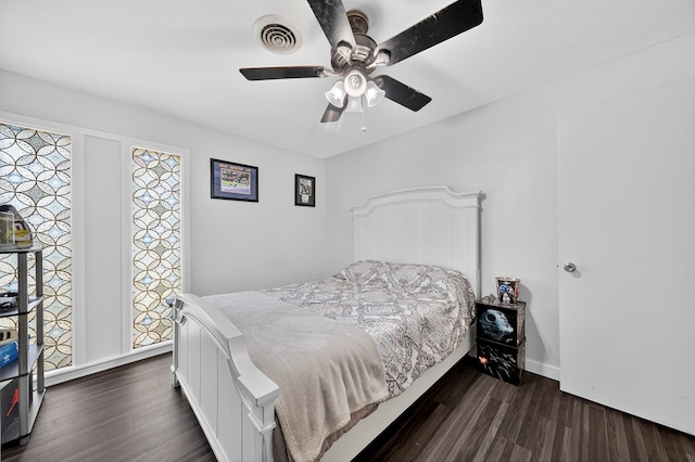 3202 Maxwell Dr, Midland, TX 79705 - bedroom featuring dark wood-type flooring and ceiling fan