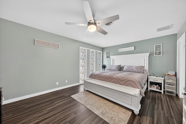 3202 Maxwell Dr, Midland, TX 79705 - bedroom with dark wood-style floors and ceiling fan