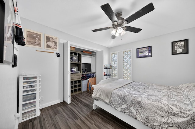 3202 Maxwell Dr, Midland, TX 79705 - bedroom with dark wood-style floors and ceiling fan