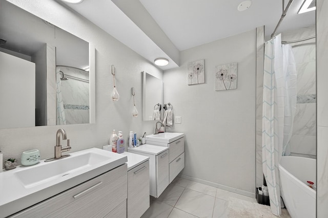 3202 Maxwell Dr, Midland, TX 79705 - bathroom featuring marble look tiles, vanity, and shower / bath combination with curtain
