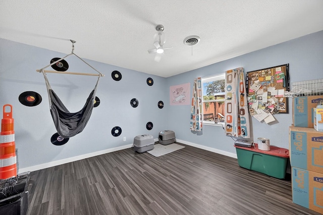 3202 Maxwell Dr, Midland, TX 79705 - rec room with wood finished floors, a textured ceiling, and a ceiling fan