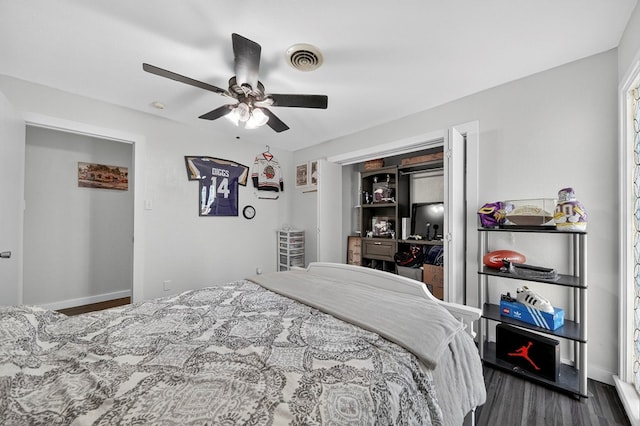 3202 Maxwell Dr, Midland, TX 79705 - bedroom with dark wood finished floors and a ceiling fan
