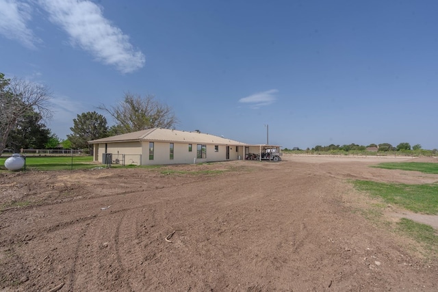 view of front of house with fence