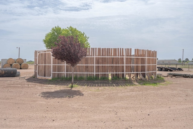 view of outdoor structure with fence