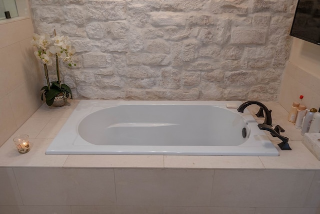 full bath featuring a bath