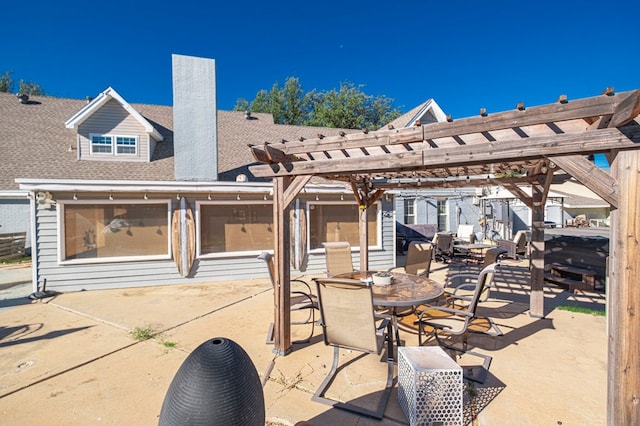 view of patio featuring a pergola