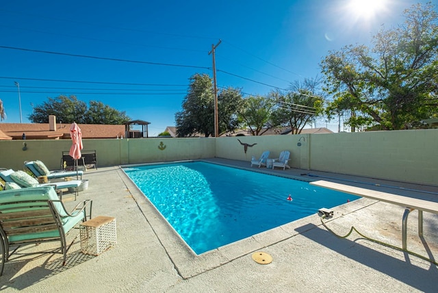 view of pool featuring a patio area