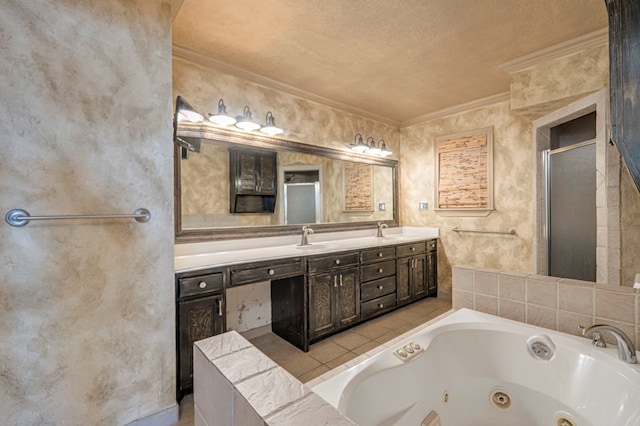 bathroom featuring vanity, crown molding, a relaxing tiled tub, and a textured ceiling