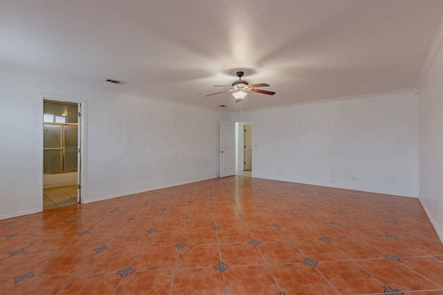 spare room featuring ornamental molding, tile patterned floors, and ceiling fan