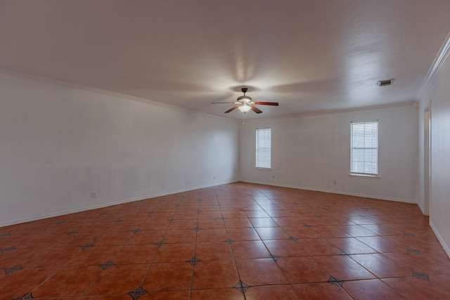 unfurnished room featuring ornamental molding, tile patterned floors, and ceiling fan