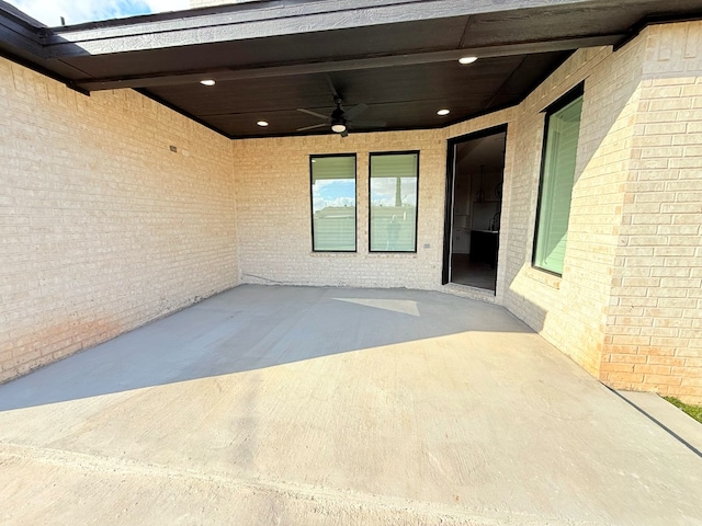 view of patio / terrace featuring ceiling fan