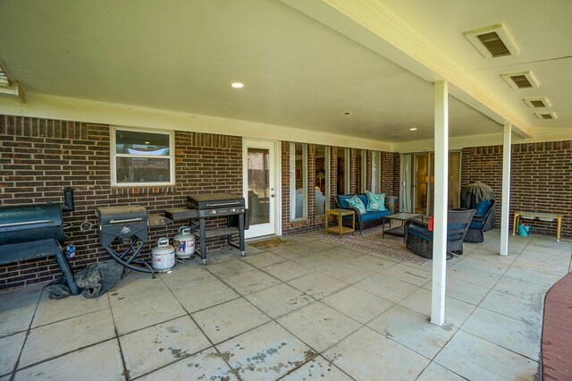 5 Bristol Ct, Midland, TX 79705 - view of patio featuring an outdoor living space and area for grilling