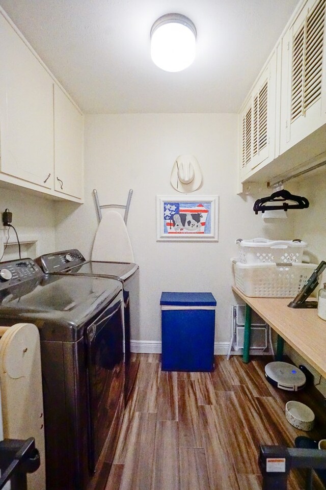 5 Bristol Ct, Midland, TX 79705 - washroom with washing machine and dryer, baseboards, cabinet space, and dark wood-type flooring