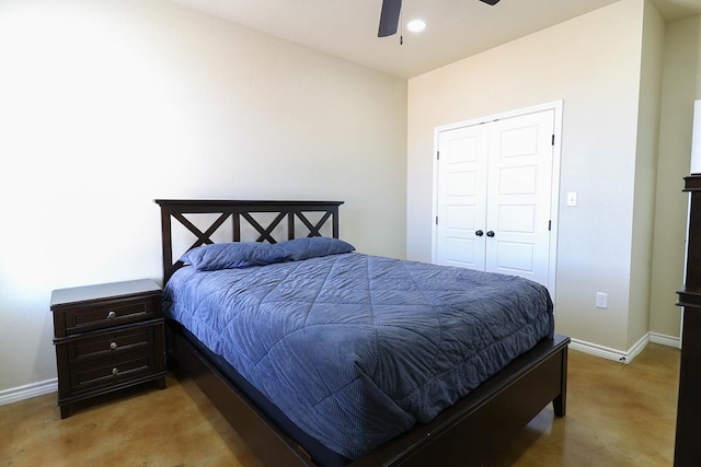 carpeted bedroom with a closet and ceiling fan