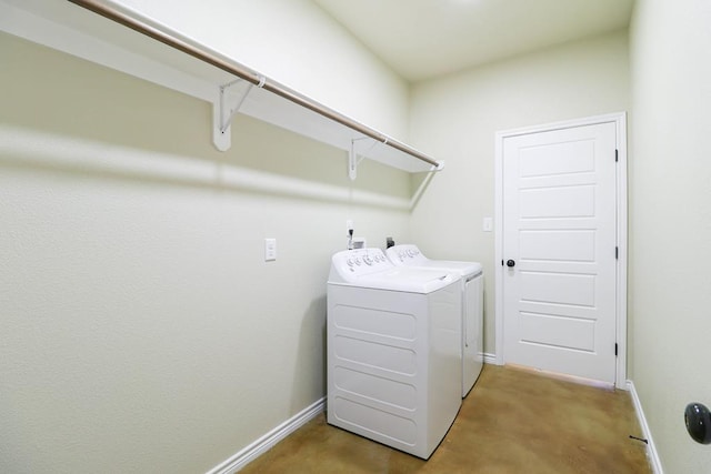 laundry area with washer and dryer and carpet floors