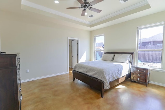 bedroom with ceiling fan, a raised ceiling, and crown molding