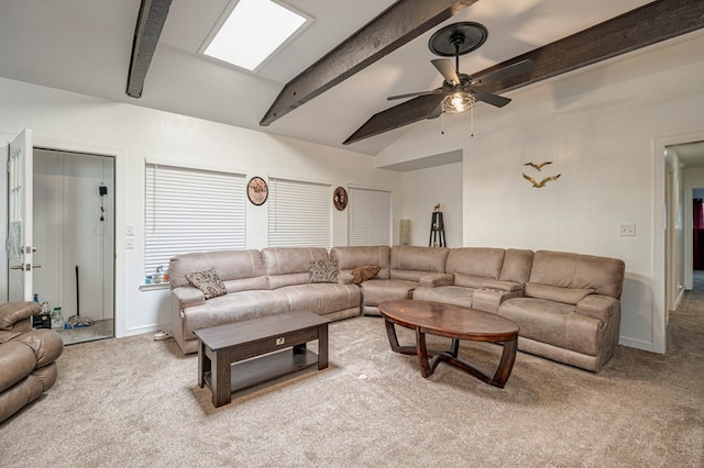 living room with vaulted ceiling with beams, light colored carpet, and ceiling fan