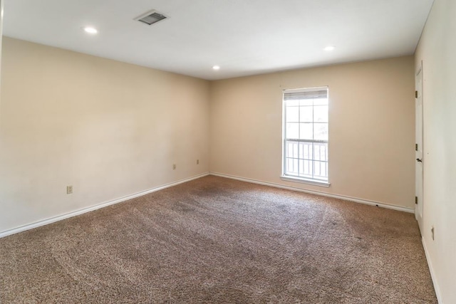 view of carpeted spare room