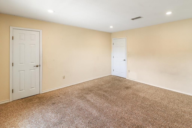 view of carpeted spare room